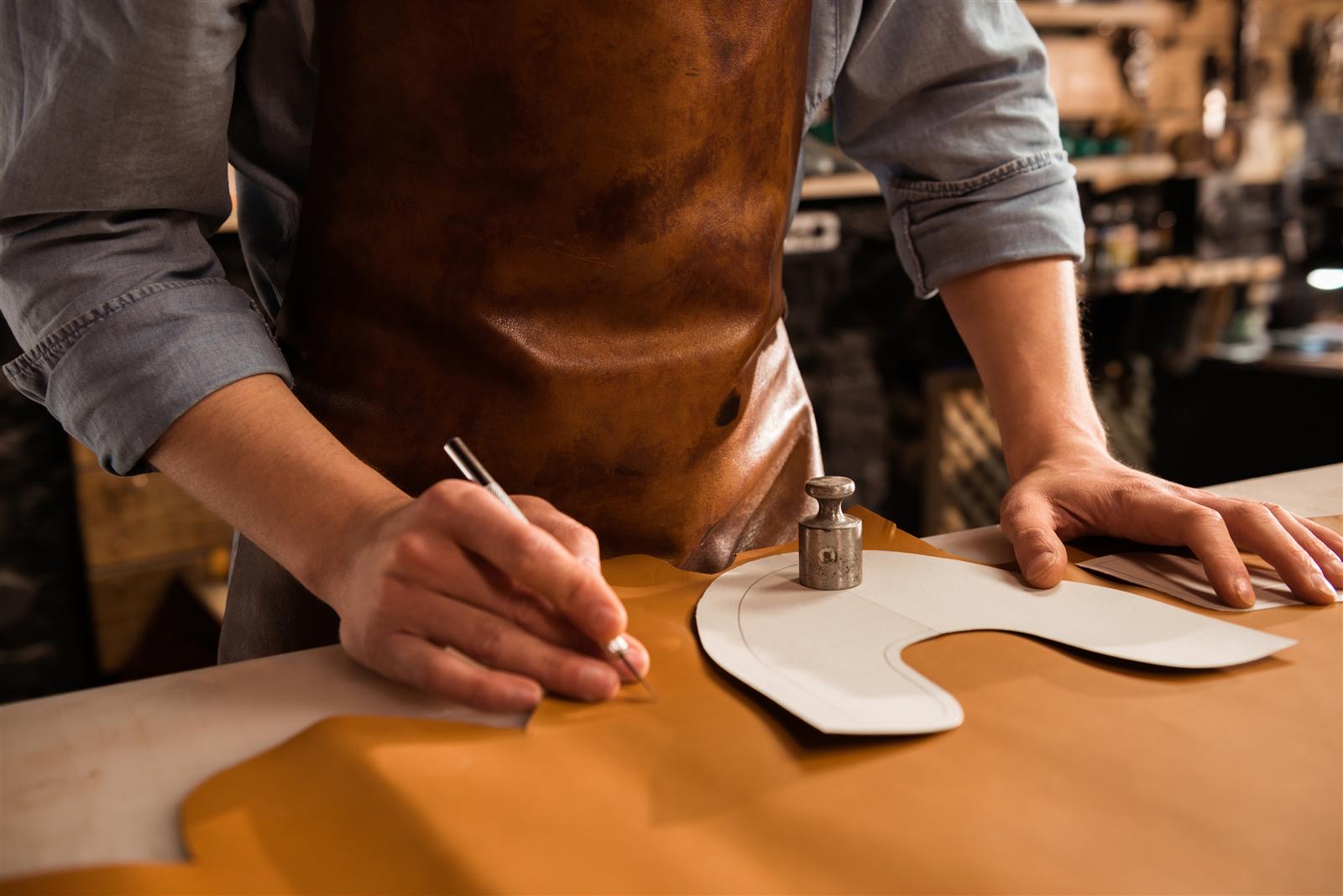 Cutting leather panels by hand