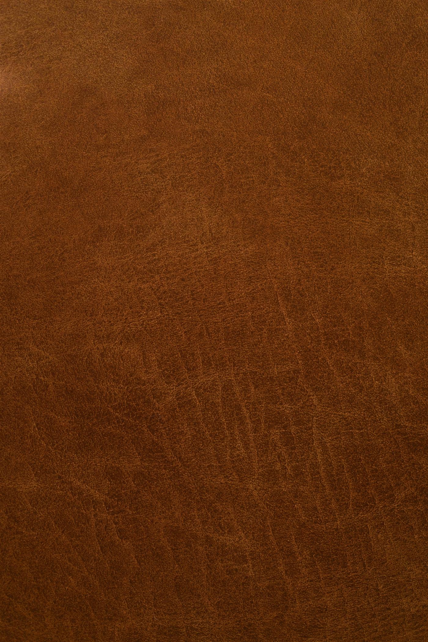 Cognac full-grain leather developing a patina